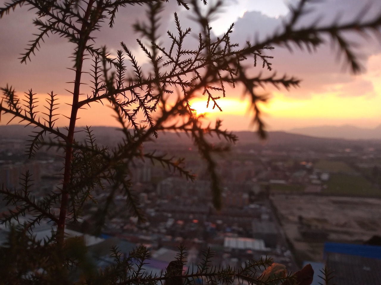 Bogota cityscape under cloudy sky