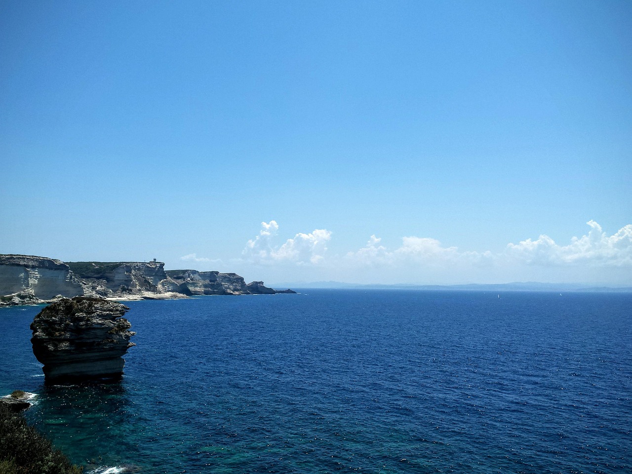 Isolated Grain de Sable rock near Bonifacio cliffs
