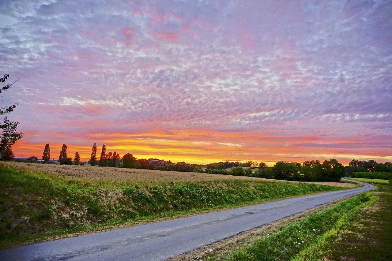 Sunset over Dordogne countryside fields and woods