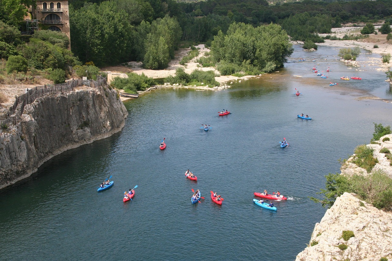 Kayaks passing under Pont du Gard