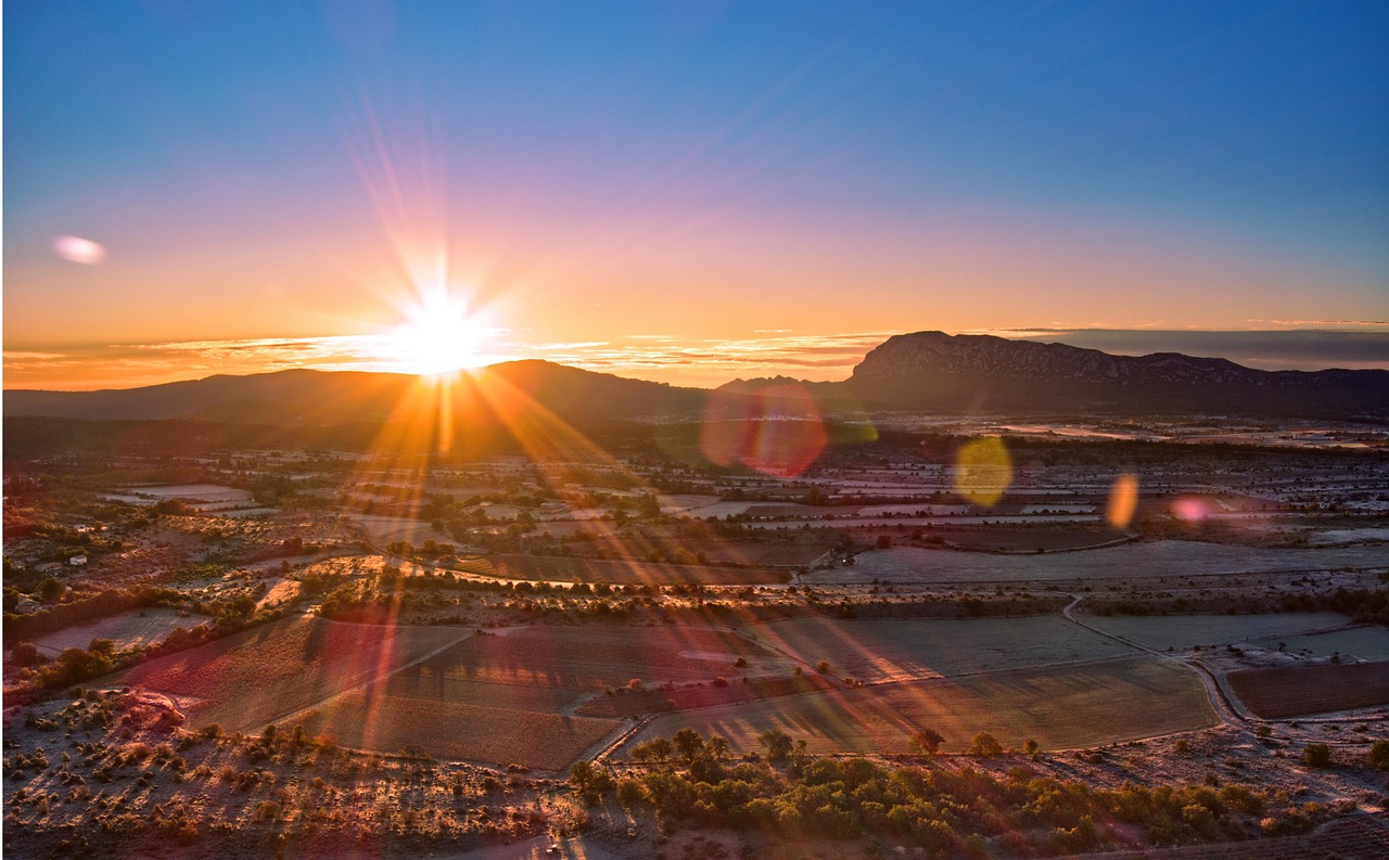 Panoramic sunset view of Roussillon village and valley