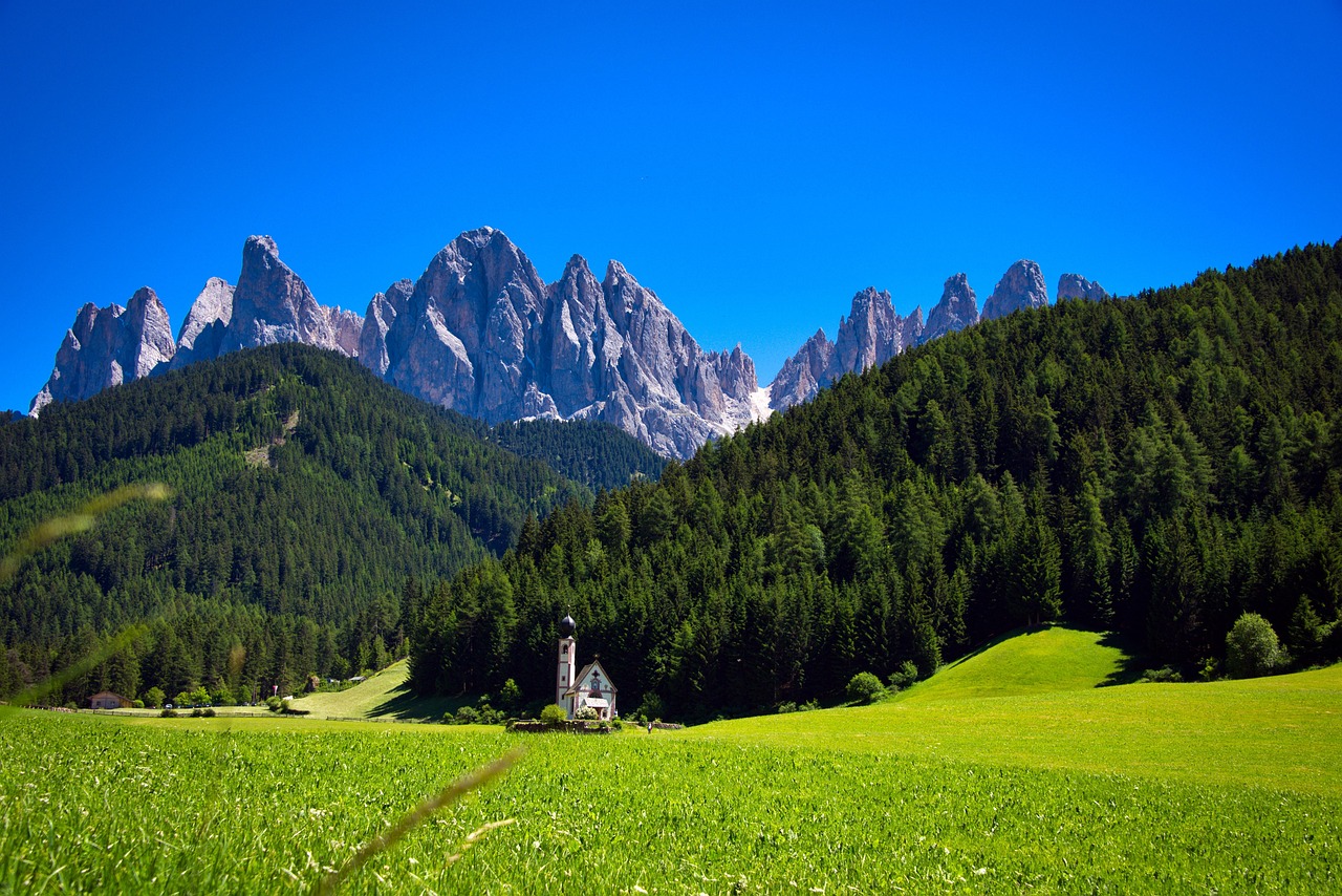 Famous church in Val di Funes with Odle peaks in background