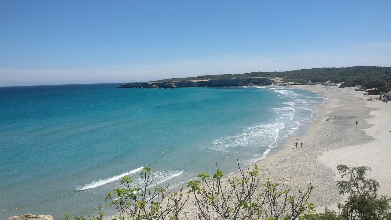 Sandy Salento beach with clear turquoise water