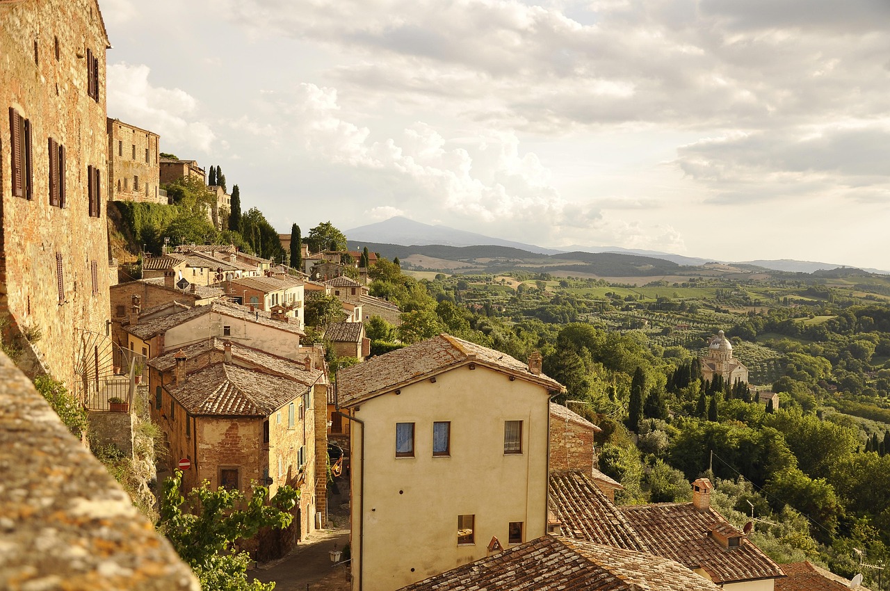 Tuscany hilltop village and vineyards