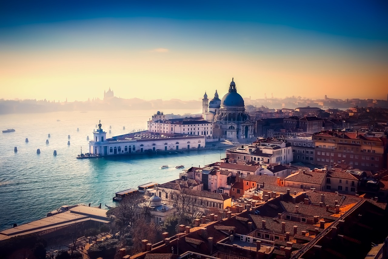 Venice skyline at sunset with domes and bell towers