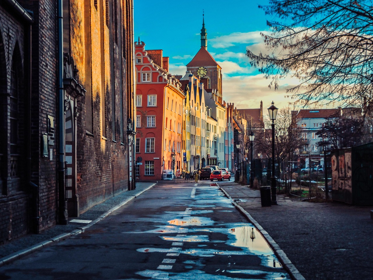 Długa Street in Gdansk with colorful houses and tourists