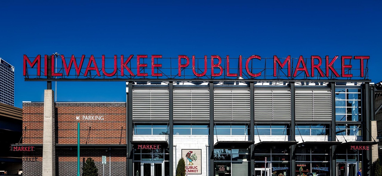 Milwaukee Public Market exterior with sign and people