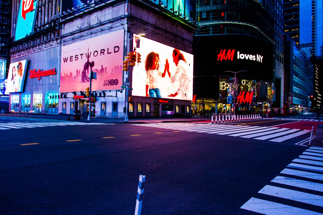 Locals and tourists walking in Times Square